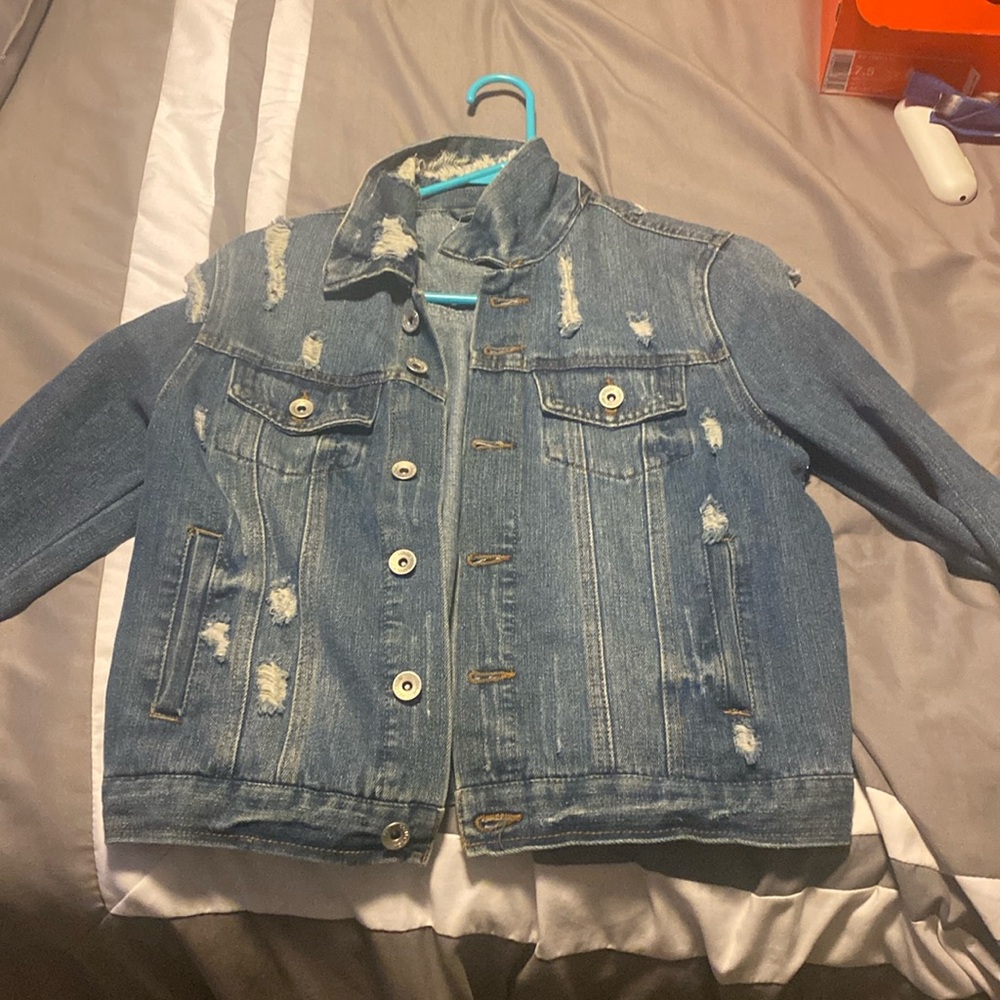 Ripped jean jacket